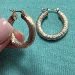 .925 sterling silver hoop earrings.